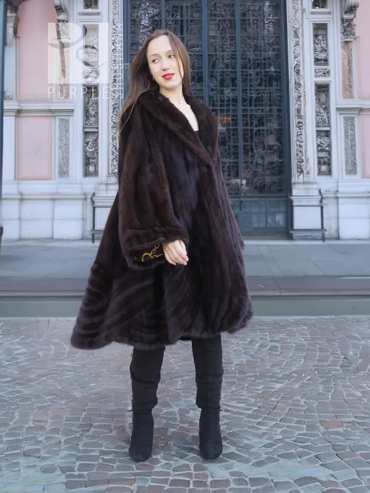 Dark brown mink swing coat with open front and flared sleeves