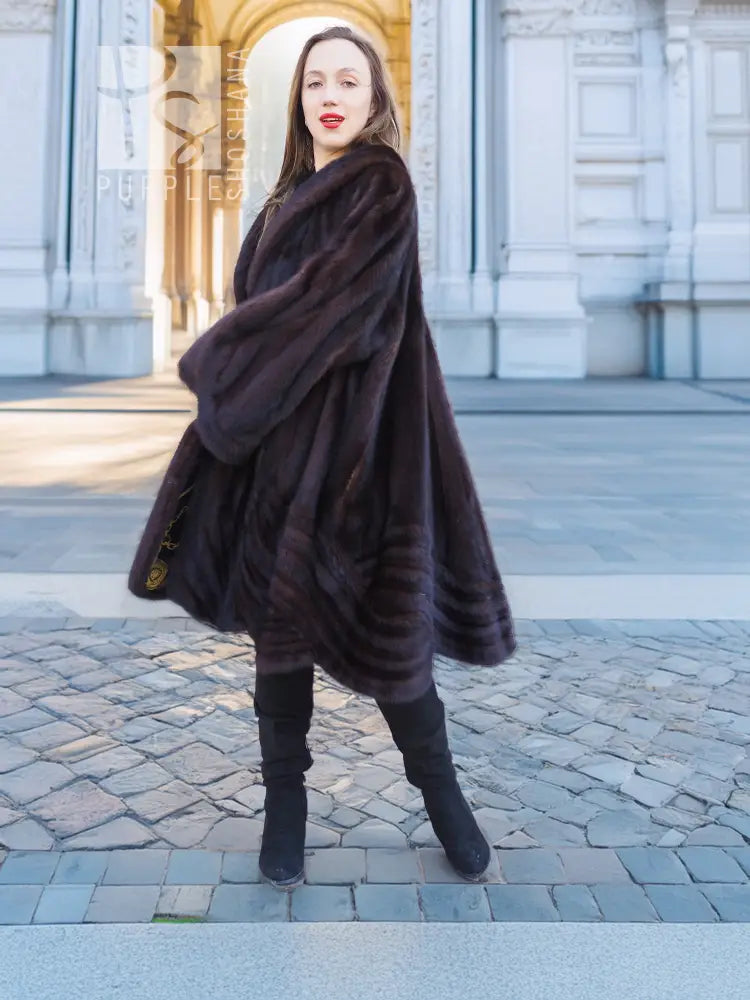 Dark mink swing coat with gold baroque trim, draped sleeves, open front