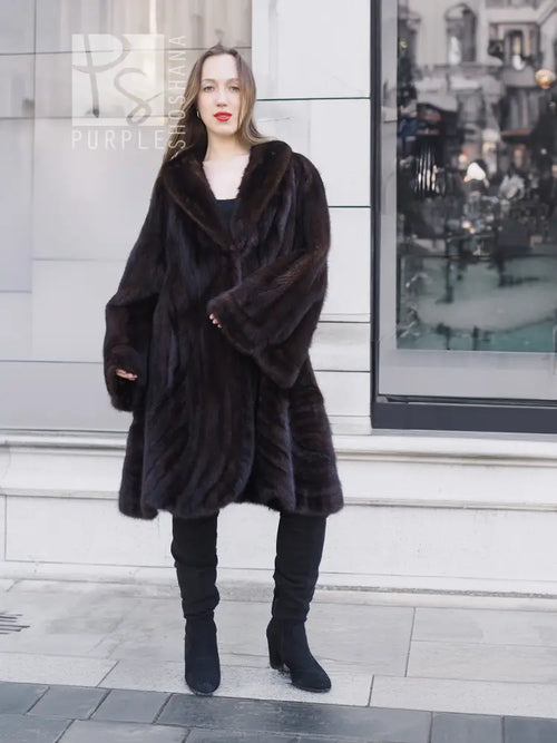 Mink swing coat with dark plush fur, hooded V-neck and wide swing panels over leggings
