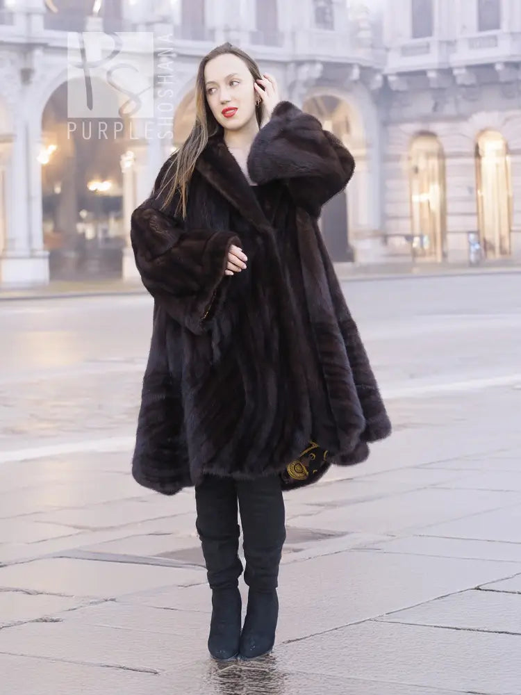 Mink swing coat with dark fur hood and thick sleeves, swing silhouette with button front