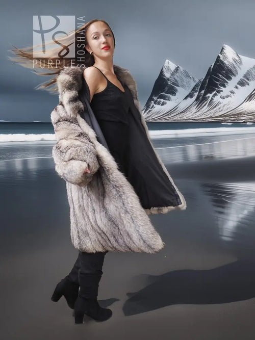 Long faux fur coat with high collar, textured sleeves, and open-front fit