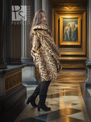 Hooded animal-print fur coat with leopard spots, tan and dark, three-quarter view