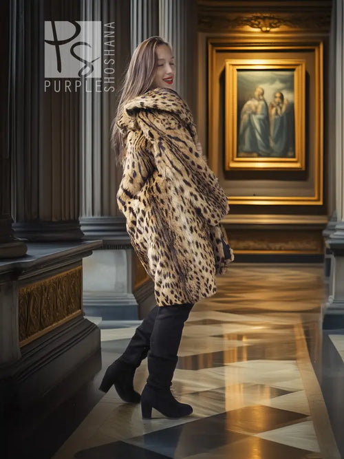 Hooded animal-print fur coat with leopard spots, tan and dark, three-quarter view