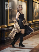 Leopard-pattern fur coat in tan with dark spots, open front, long sleeves