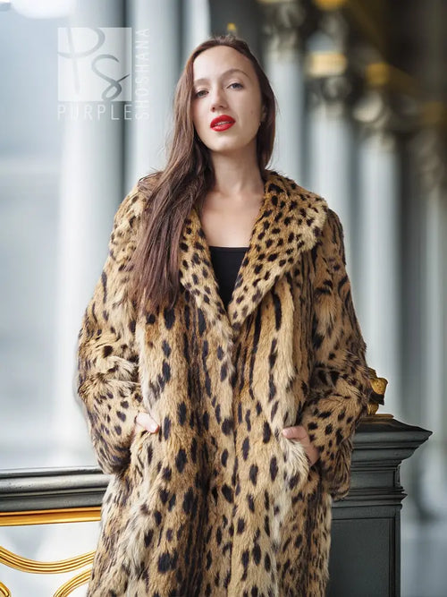 Faux fur leopard-pattern coat with shawl collar, long sleeves, open front