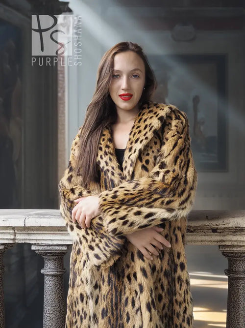 Leopard-spotted fur coat with hood, tan with dark pattern, relaxed portrait view