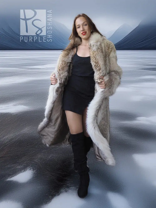 Coyote fur coat with white trim, long sleeves and shaggy open front