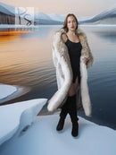 Long fur coat with white accents, cozy hoodless style and open-front silhouette