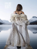 Coyote fur coat in coyote tones with white trim, back view and long sleeves