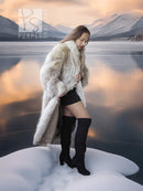 Coyote fur coat with white trim, long sleeves and shaggy cuffs