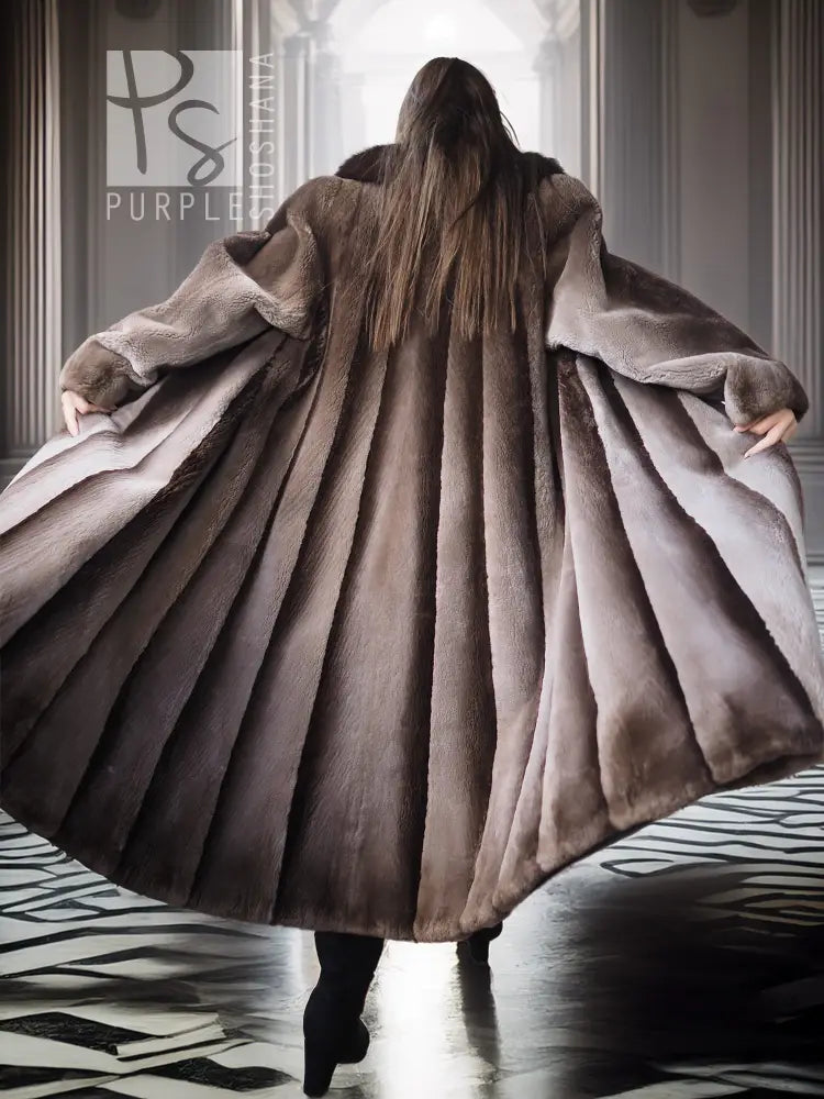 Beaver fur full-length coat seen from back, wide flared skirt and dramatic collar