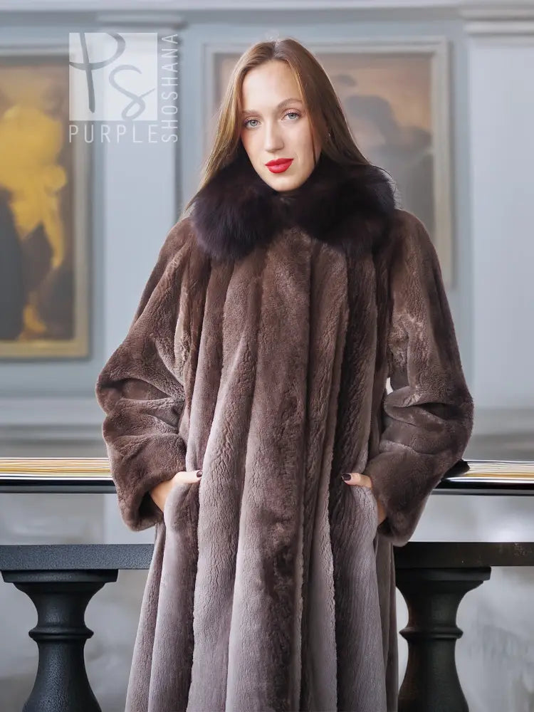 Dark brown full-length sheared beaver coat with dramatic wide collar and flared hem