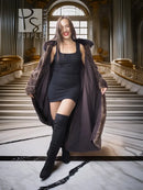 Women’s long dark brown beaver coat with dramatic collar and open, cape-like flared back