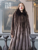 Beaver fur full-length coat with dense texture, dramatic collar, and flared silhouette