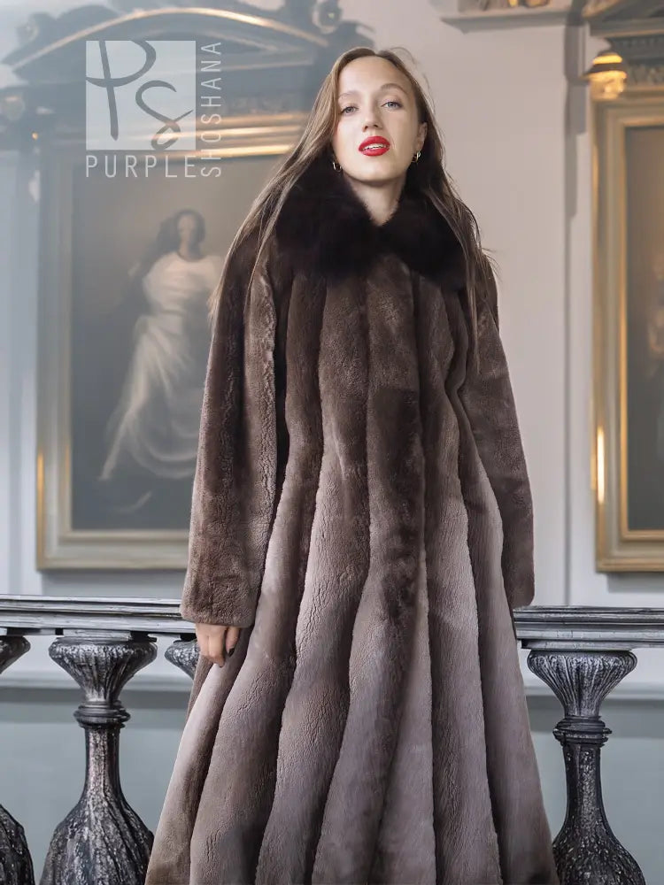 Beaver fur full-length coat with dense texture, dramatic collar, and flared silhouette