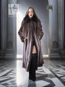 Full-length beaver fur coat with dramatic dark collar and flared sweep