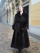 Black mink full-length coat with hooded fur collar and belt