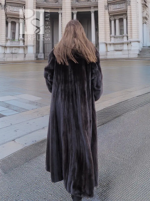 Black mink fur coat with long back drape and full length sweep hem
