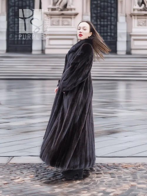 Black mink long coat with flowing A-line shape and wide sleeves