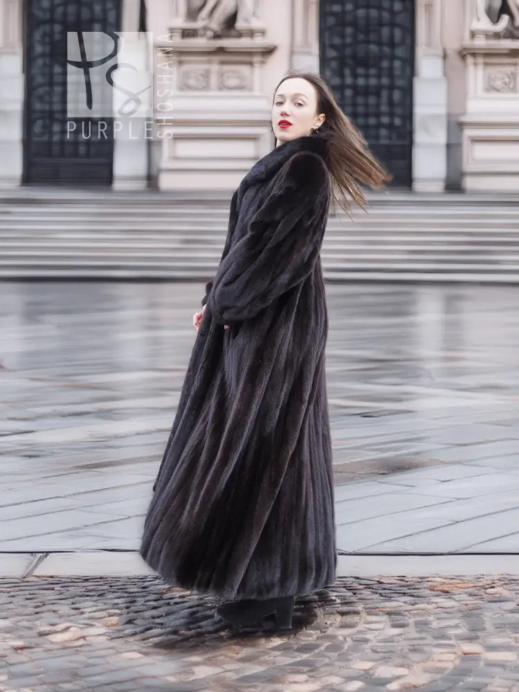 Black mink long coat with flowing A-line shape and wide sleeves