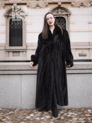 Black mink full-length coat with voluminous sleeves and open front for layering