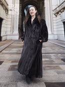 Black mink full-length sweep coat with V neckline and flowing drape