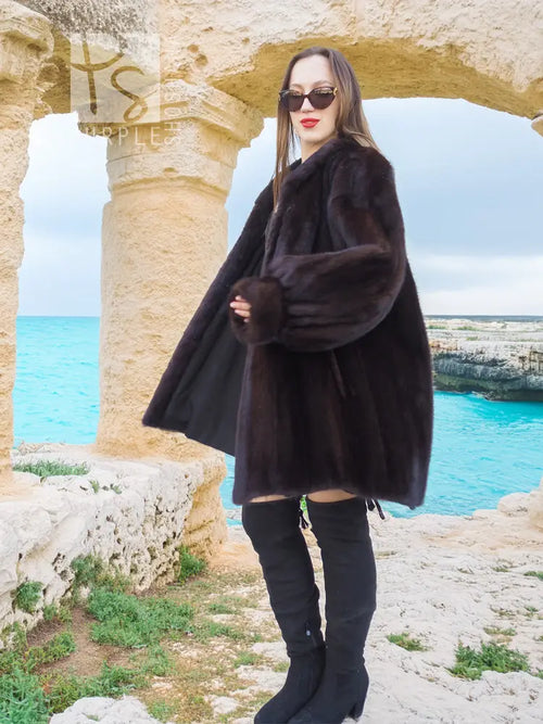 Black mink swing jacket coat with wrap-style drape and long sleeves