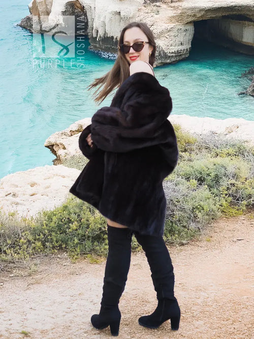 Black mink swing jacket coat with plush texture and oversized shoulder volume