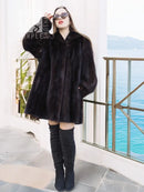 Black mink swing jacket coat with buttoned front and voluminous sleeves