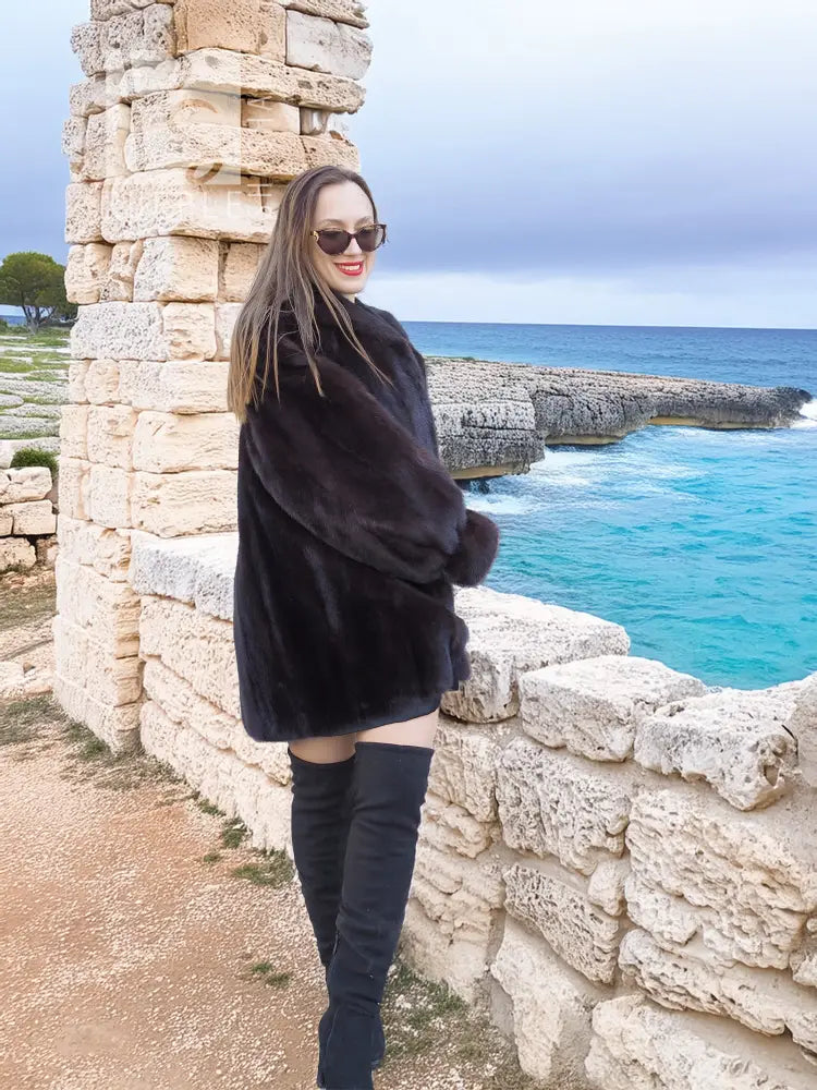 Black mink swing jacket coat with side profile, wide collar and long sleeves