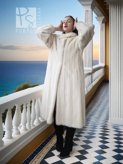 Ivory mink fur coat with high collar and long sleeves
