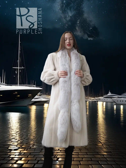 Ivory mink fur coat with stand collar, long sleeves, and full-length fit