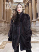Dark vintage mink swing coat with high collar, long sleeves, plush fur texture, front button.