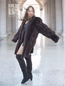 Vintage mink swing coat in dark brown, angled front view with full sleeves and swing hem