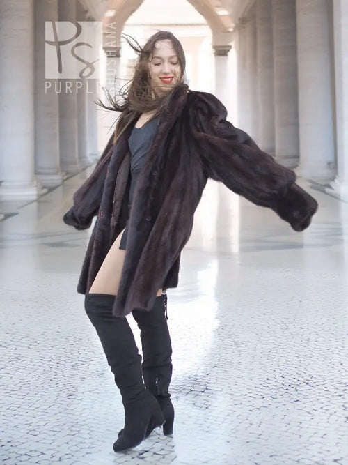 Vintage mink swing coat in dark brown, angled front view with full sleeves and swing hem
