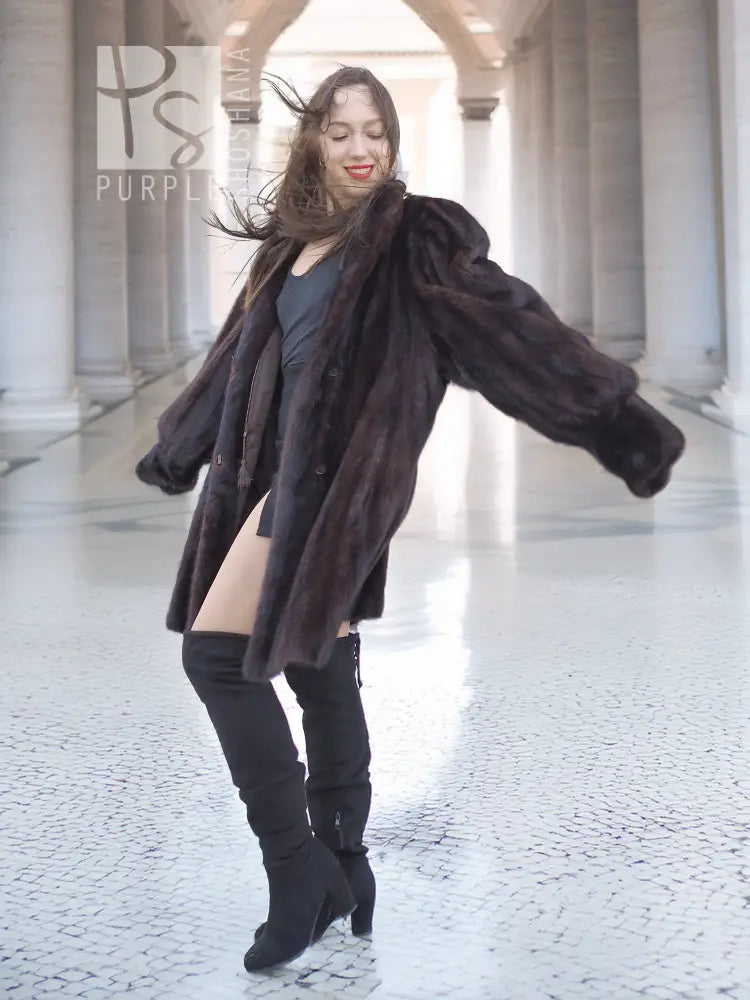 Vintage mink swing coat in dark brown, angled front view with full sleeves and swing hem