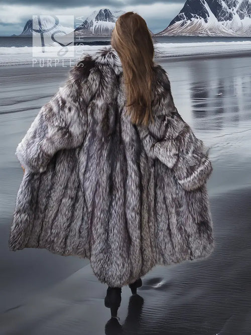 Gray faux fur long coat viewed from the back, with wide collar and long sleeves.