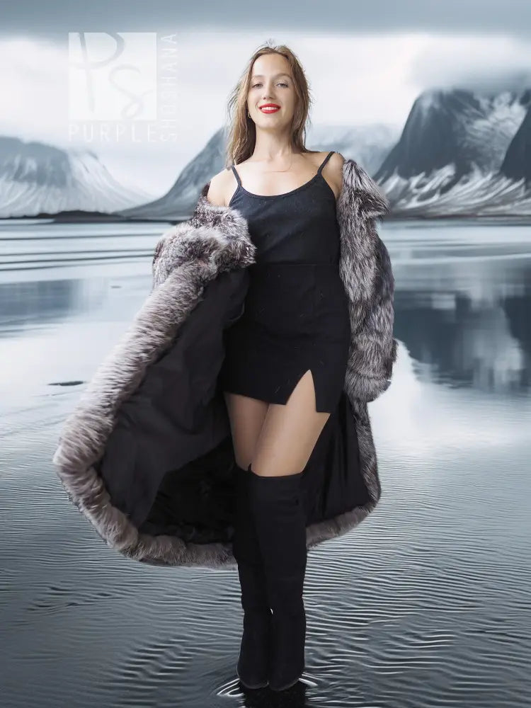 Gray faux fur wrap or stole with long sleeves, draped over shoulders and arms.