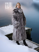 Long silver fox fur coat with full sleeves and gray-and-white striped pattern, side view
