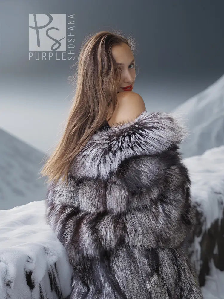 Silver fox fur coat detail view with wide collar and gray-and-white fur pattern, shoulder shot