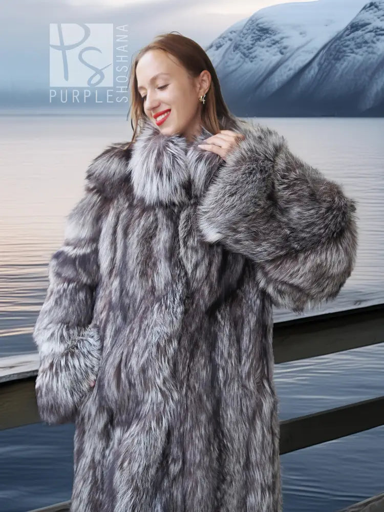Silver fox fur coat close view with thick collar and gray-and-white striped fur texture