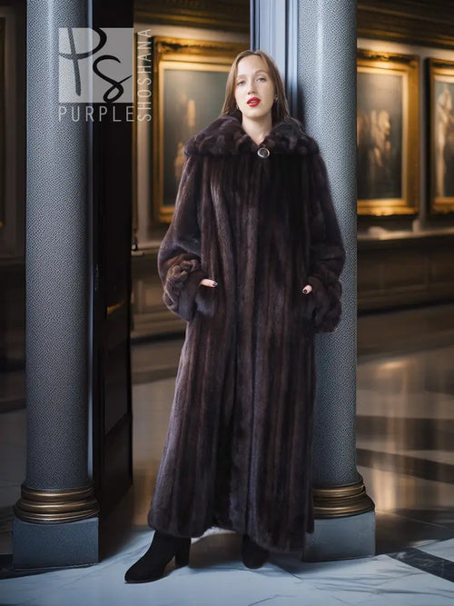 Dark mink fur coat with button detail and voluminous sleeves, long length