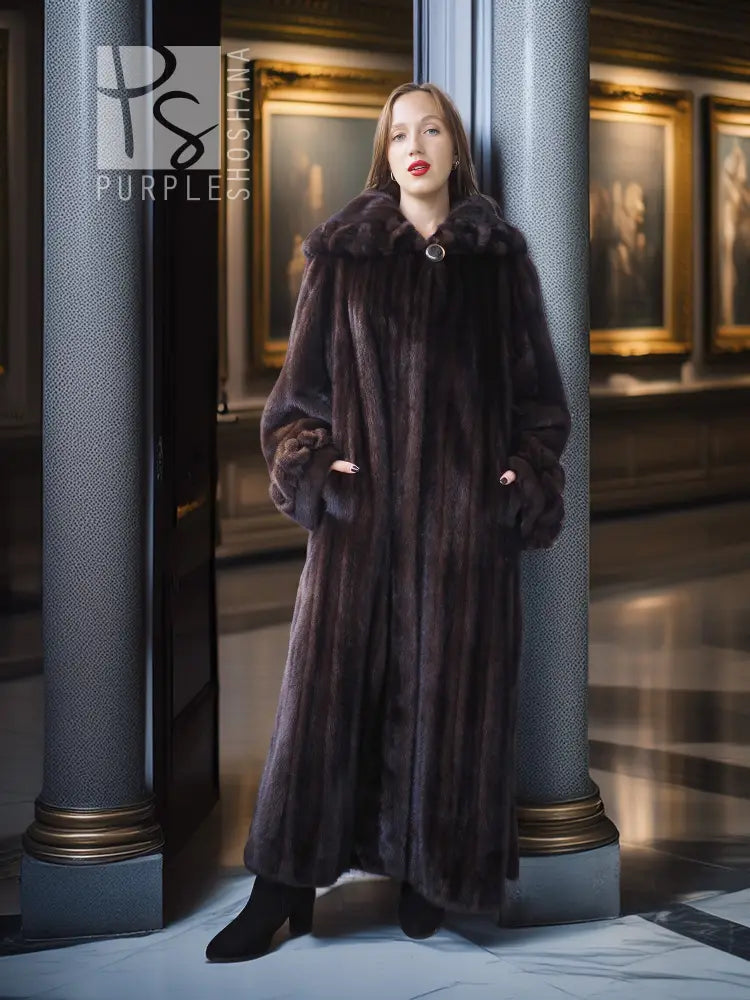 Dark mink fur coat with button detail and voluminous sleeves, long length