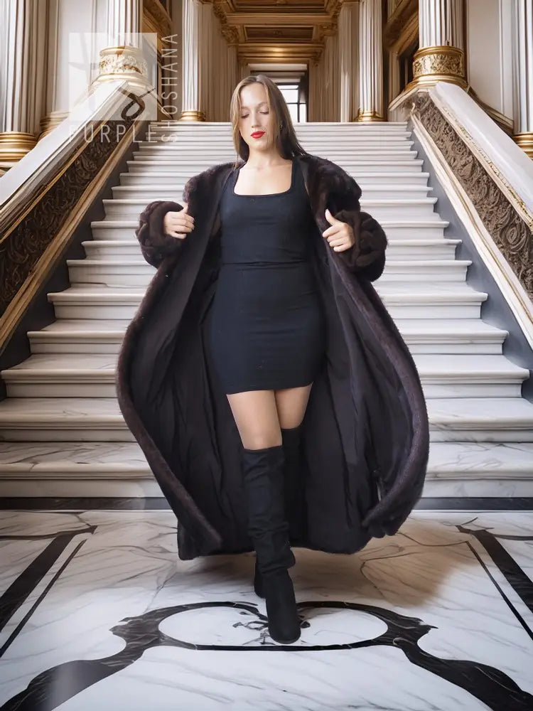 Dark mink coat worn open, oversized collar, long sleeves, full length.