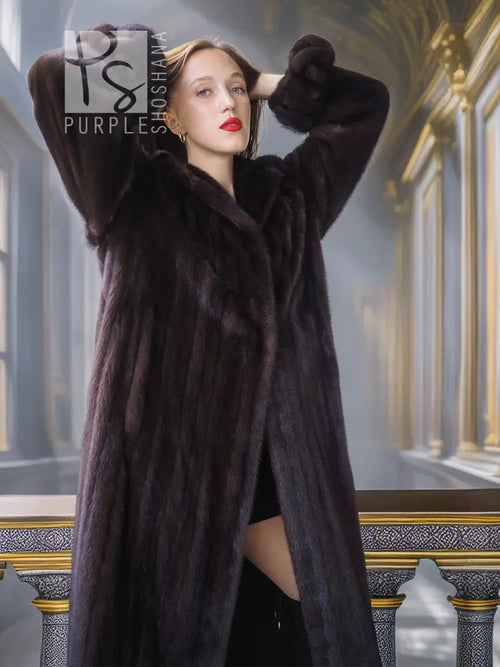 Dark mink coat with high collar, long sleeves, and side slit detailing.