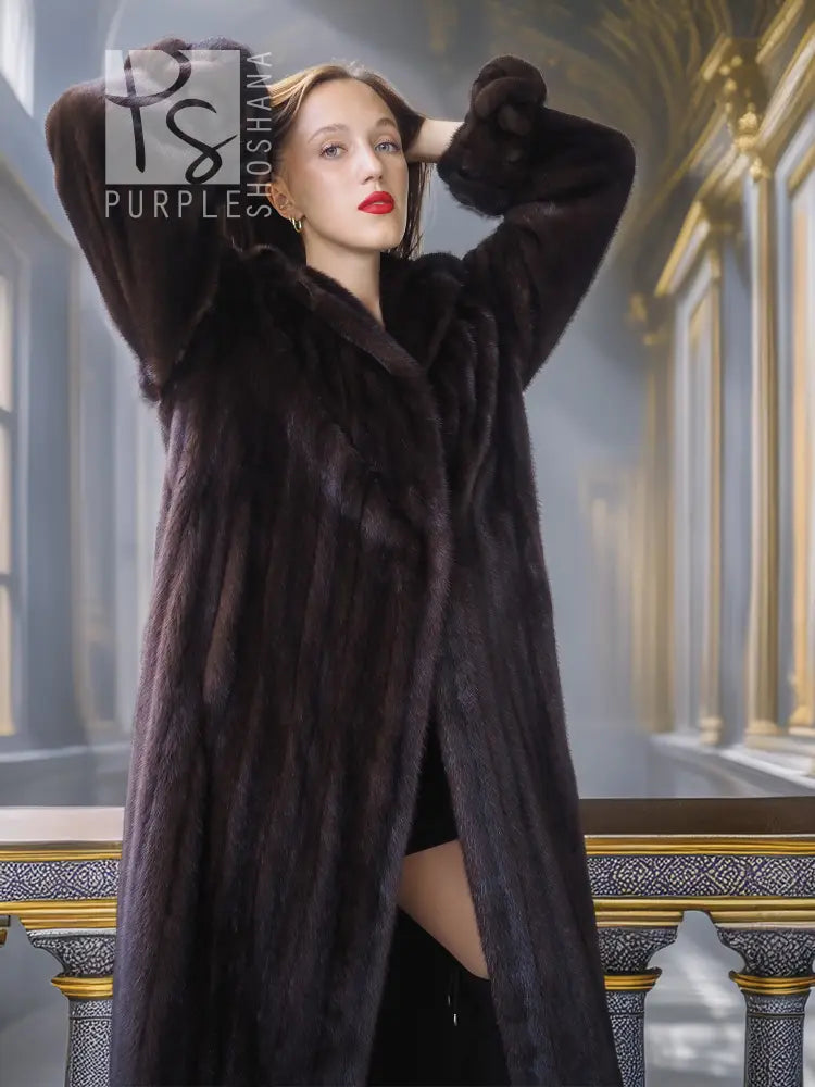 Dark mink coat with high collar, long sleeves, and side slit detailing.