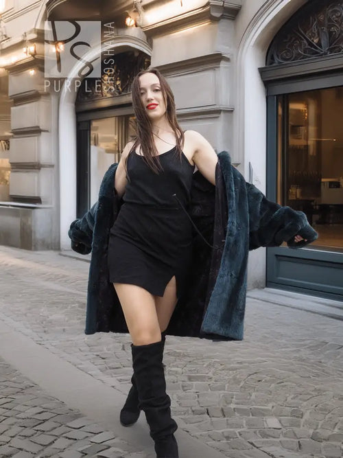 Sheared muskrat fur coat, deep teal, relaxed fit with open sides and roomy sleeves
