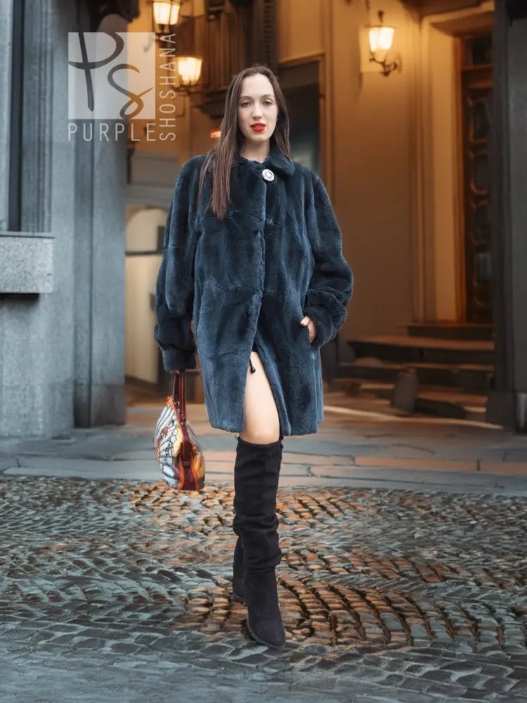 Sheared muskrat fur coat, deep teal, full-length front with plush shear texture