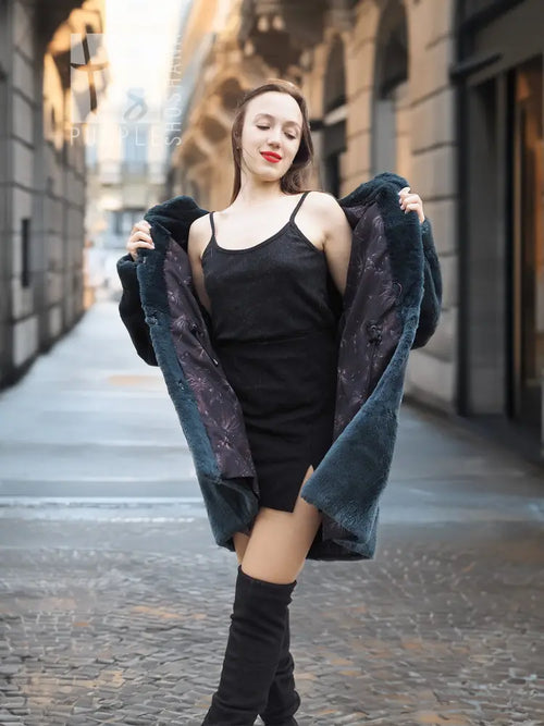 Sheared muskrat fur coat, deep teal, open front with relaxed shoulder line