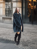 Deep teal muskrat fur coat with front button closure and long sleeves, relaxed front view